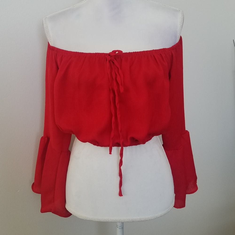Red bell sleeved off the shoulder